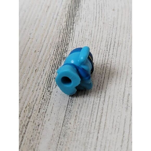 Miniature rubber elephant train conductor toy figure - Picture 4 of 4